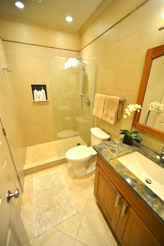 full bathroom with crown molding, walk in shower, vanity, toilet, and tile patterned floors