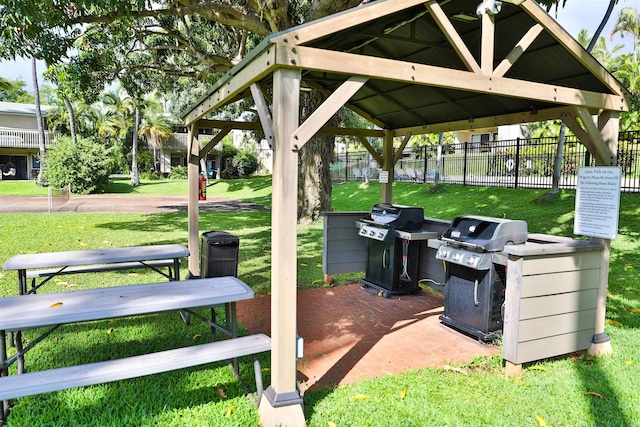 view of patio / terrace featuring a gazebo, fence, and area for grilling