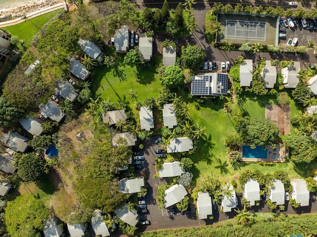 birds eye view of property with a residential view