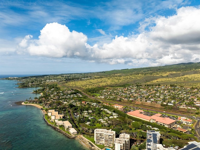 birds eye view of property featuring a water view and a residential view