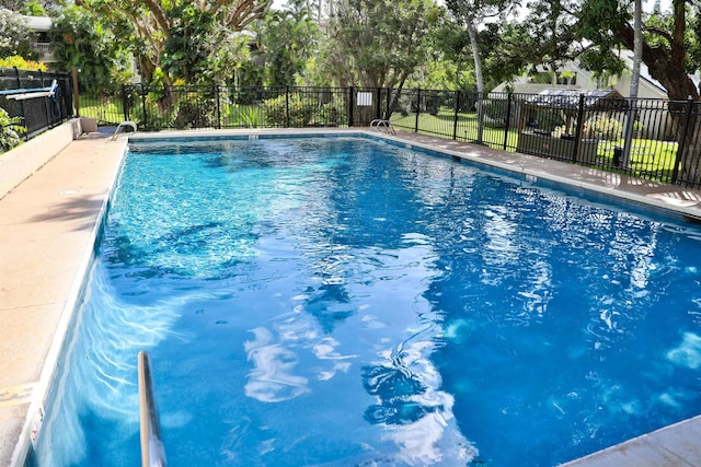 community pool with fence