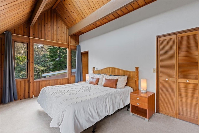 bedroom with wood ceiling, lofted ceiling with beams, and light carpet