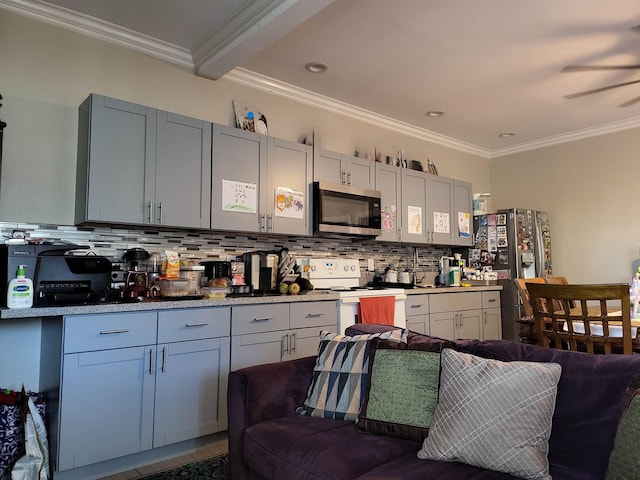 2170 Kahookele St, Wailuku, HI 96793 - kitchen with open floor plan, stainless steel appliances, crown molding, and decorative backsplash