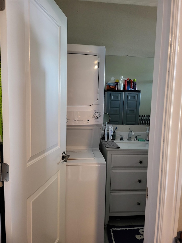 2170 Kahookele St, Wailuku, HI 96793 - washroom with a sink, stacked washer / drying machine, and laundry area
