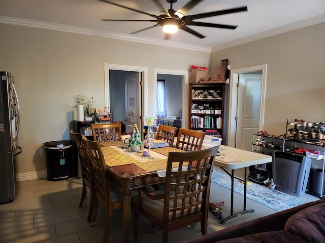 2170 Kahookele St, Wailuku, HI 96793 - dining area featuring baseboards, crown molding, and a ceiling fan
