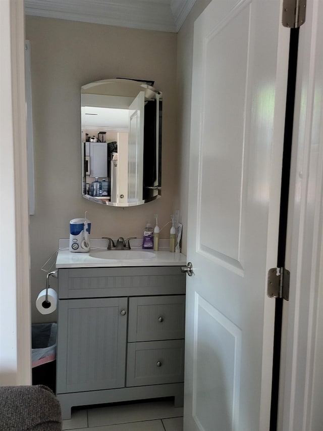 2170 Kahookele St, Wailuku, HI 96793 - bathroom featuring tile patterned floors, vanity, and ornamental molding