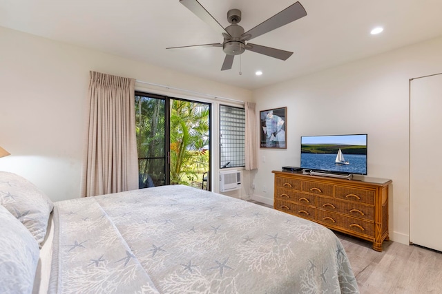 bedroom with access to exterior, light hardwood / wood-style floors, and ceiling fan