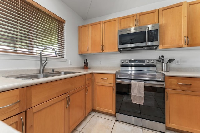 35 Emoloa Pl, Wailuku, HI 96793 - kitchen with appliances with stainless steel finishes, light countertops, and light tile patterned flooring
