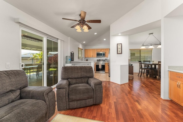 35 Emoloa Pl, Wailuku, HI 96793 - living room with ceiling fan, wood finished floors, vaulted ceiling, and recessed lighting