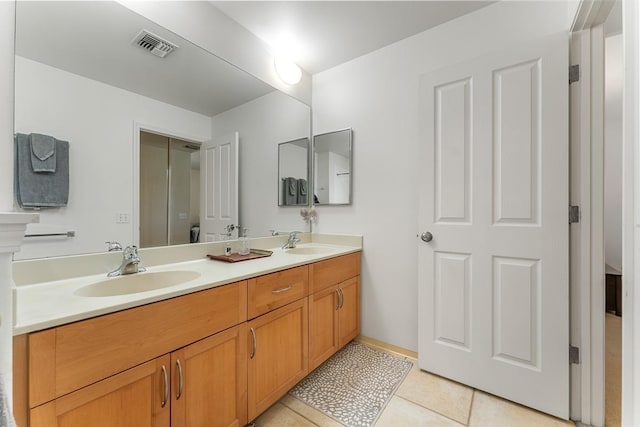 35 Emoloa Pl, Wailuku, HI 96793 - bathroom featuring double vanity and tile patterned flooring