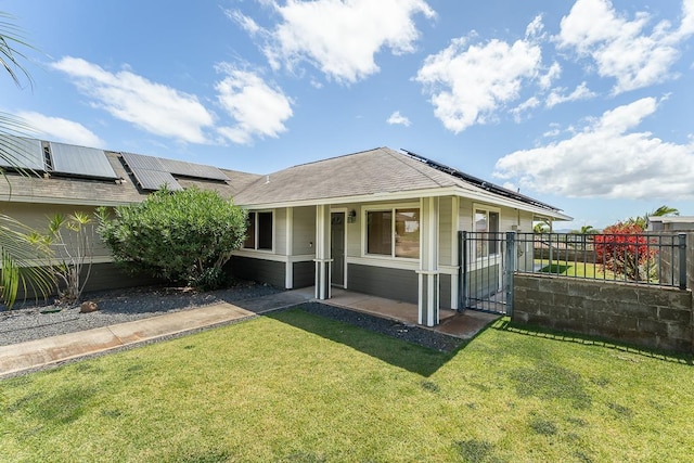 35 Emoloa Pl, Wailuku, HI 96793 - rear view of house featuring solar panels and a gate