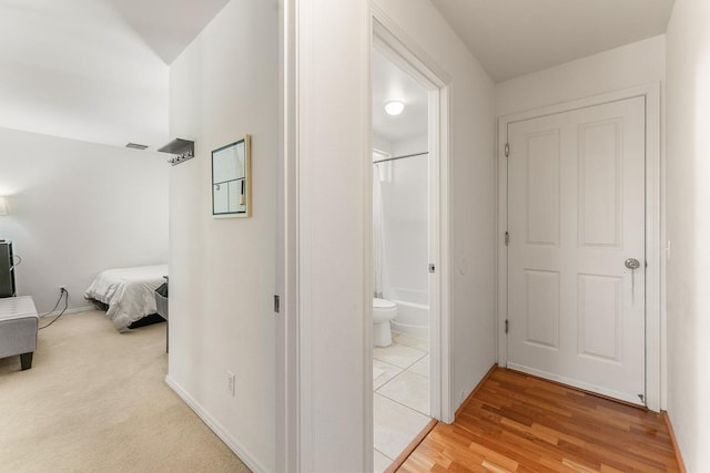 35 Emoloa Pl, Wailuku, HI 96793 - hallway featuring baseboards and light wood-style flooring