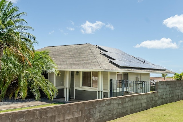 35 Emoloa Pl, Wailuku, HI 96793 - view of front of home with solar panels and covered porch