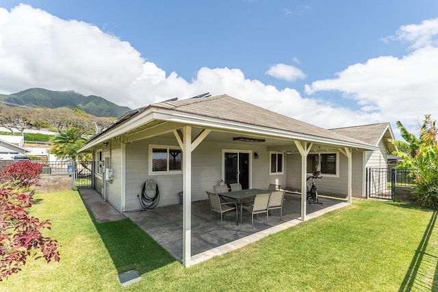 35 Emoloa Pl, Wailuku, HI 96793 - rear view of property with a gate, a patio area, a mountain view, and roof with shingles