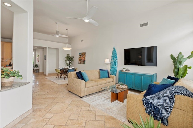 living room with ceiling fan