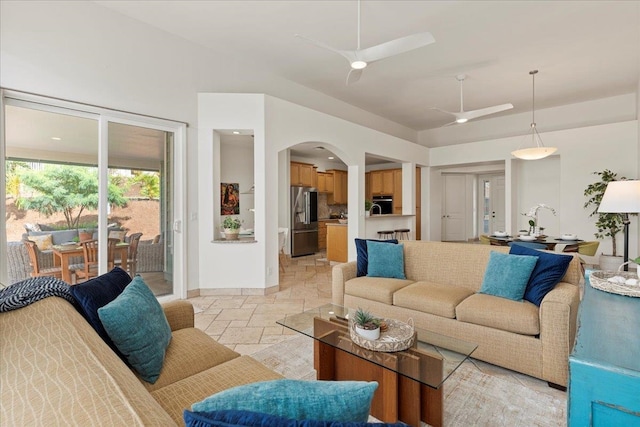 living room with ceiling fan