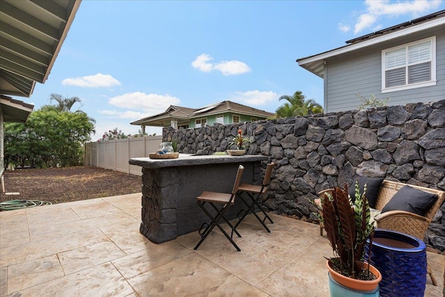 view of patio featuring a bar