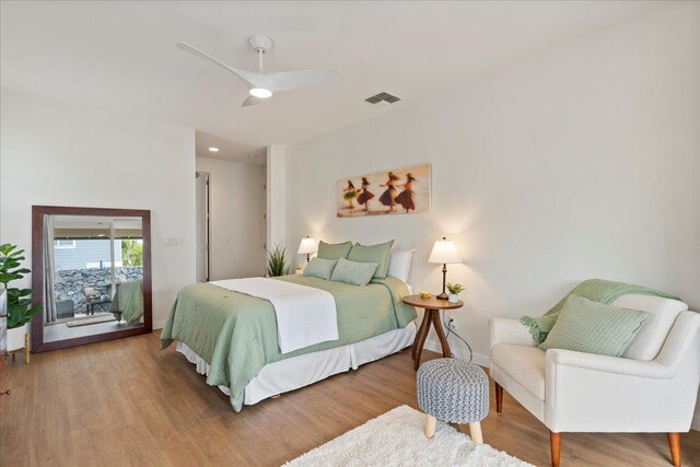 bedroom featuring ceiling fan and wood-type flooring