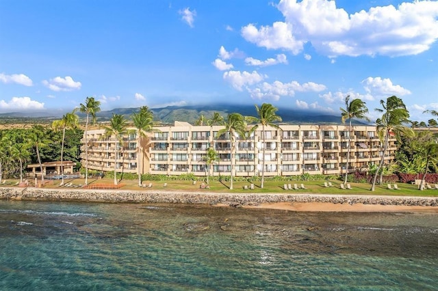 view of building exterior with a water view