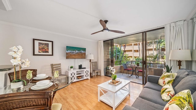 living room featuring floor to ceiling windows, ceiling fan, crown molding, and wood-type flooring