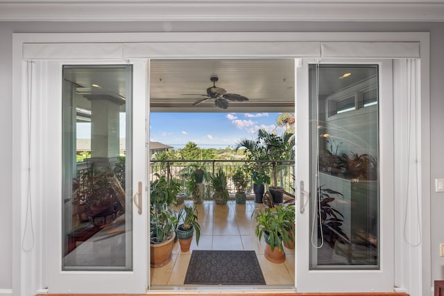 doorway to outside with ceiling fan