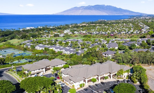 bird's eye view with a water and mountain view