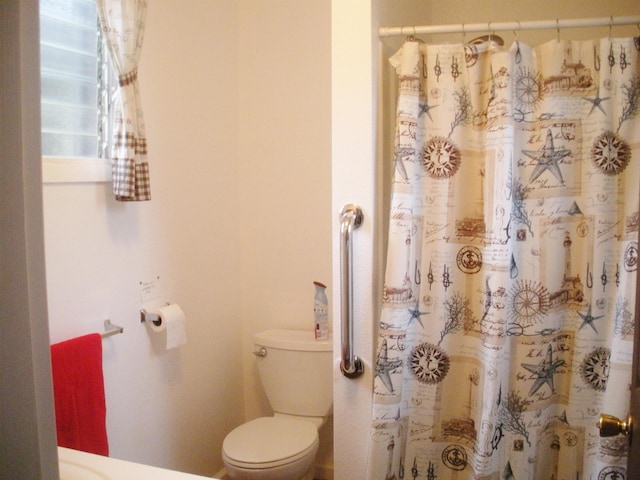 928 Lanai Ave, Lanai City, HI 96763 - bathroom with toilet and curtained shower