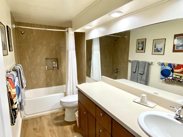 50 Kepuhi Pl Unit 117, Maunaloa, HI 96770 - bathroom with toilet, vanity, shower / bath combination with curtain, and wood finished floors