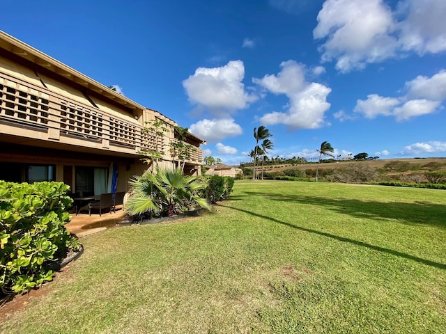 50 Kepuhi Pl Unit 117, Maunaloa, HI 96770 - view of yard featuring a balcony