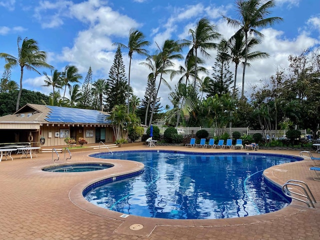 50 Kepuhi Pl Unit 117, Maunaloa, HI 96770 - pool with fence, a patio area, and a community hot tub