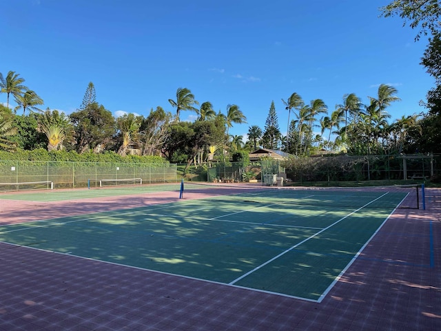 50 Kepuhi Pl Unit 117, Maunaloa, HI 96770 - view of tennis court featuring community basketball court and fence