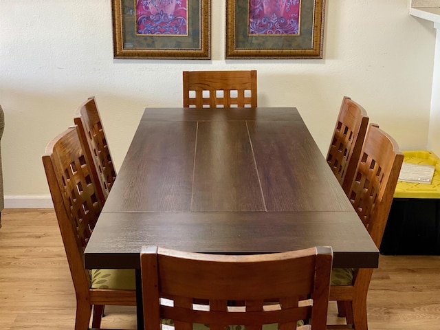 50 Kepuhi Pl Unit 117, Maunaloa, HI 96770 - dining space featuring wood finished floors and baseboards