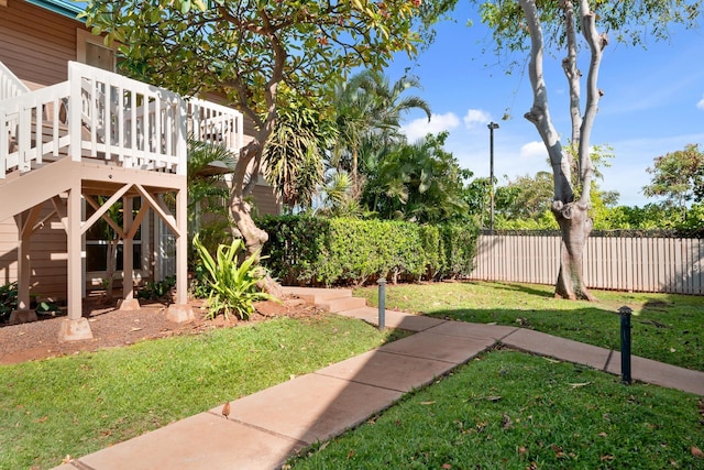 view of yard with a wooden deck