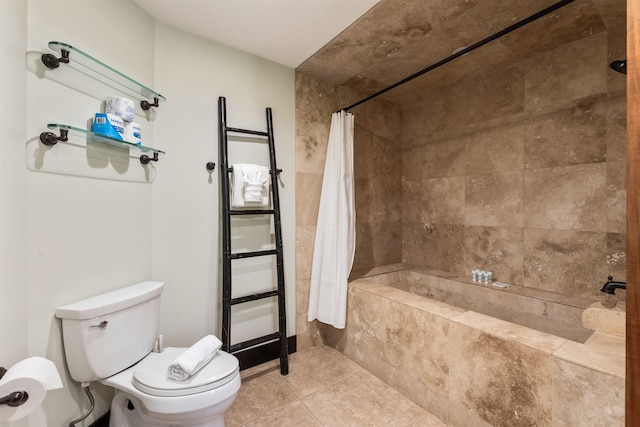 bathroom featuring tile patterned flooring and toilet