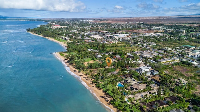 drone / aerial view with a view of the beach and a water view