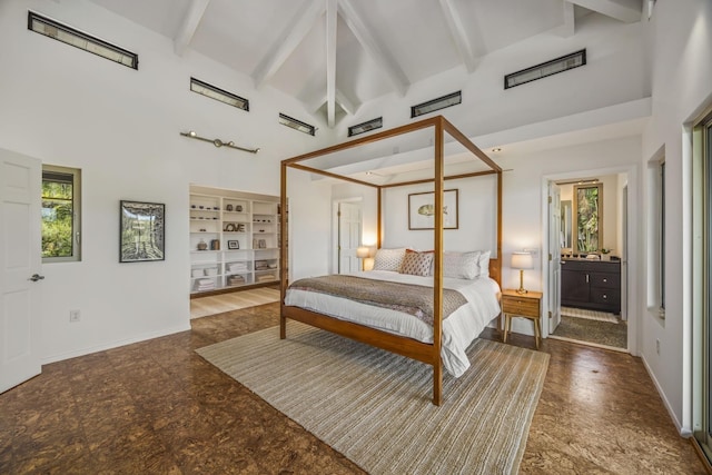 bedroom featuring beamed ceiling, baseboards, and high vaulted ceiling