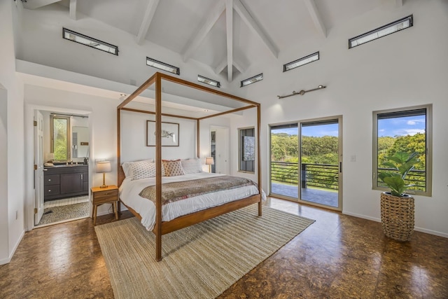 bedroom with baseboards, beamed ceiling, ensuite bathroom, high vaulted ceiling, and access to outside
