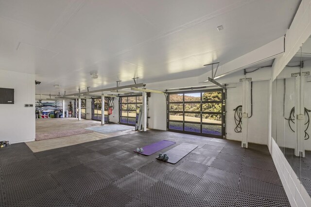 gym with dark colored carpet