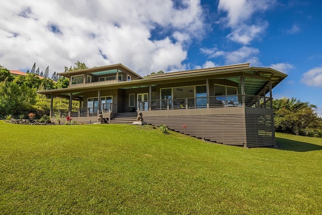 view of front facade with a front lawn and covered porch