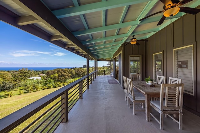 view of patio featuring a balcony and ceiling fan
