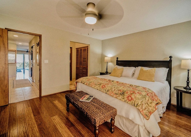 bedroom featuring wood-type flooring and ceiling fan