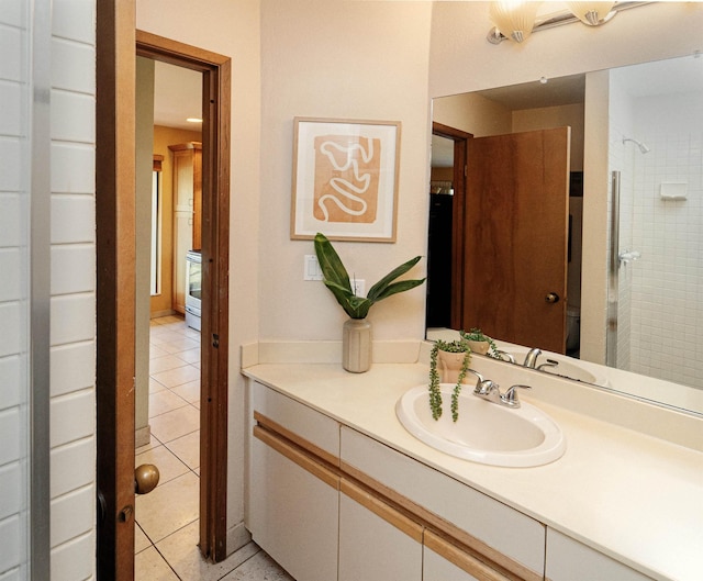 bathroom featuring tile patterned floors and vanity