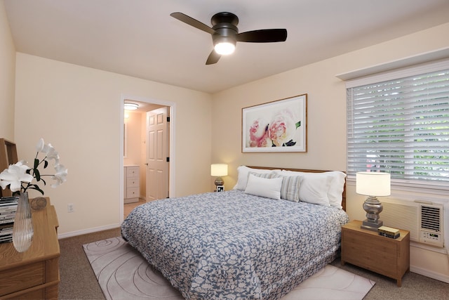 carpeted bedroom featuring connected bathroom and ceiling fan