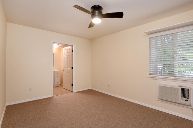 unfurnished room with ceiling fan and light colored carpet