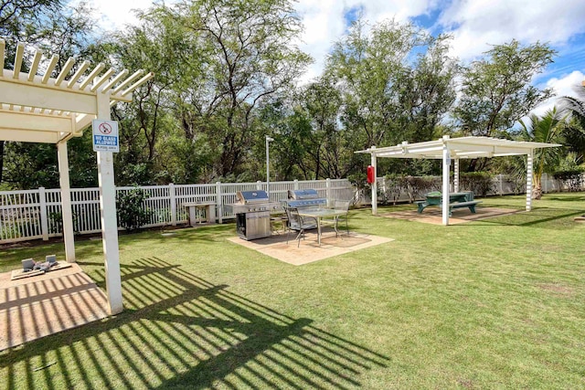 view of yard featuring a patio area and a pergola