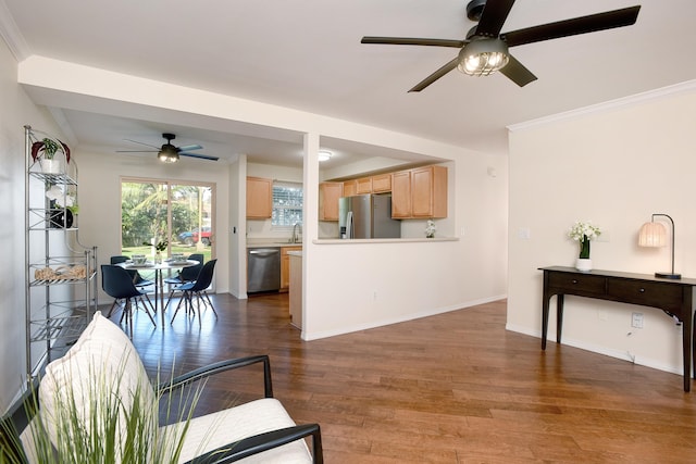 living room with ceiling fan, ornamental molding, and dark hardwood / wood-style flooring