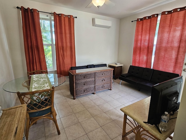 160 Kuli Puu St, Kihei, HI 96753 - living area with a wall mounted air conditioner, light tile patterned floors, and a ceiling fan