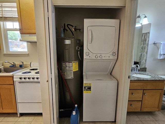 160 Kuli Puu St, Kihei, HI 96753 - washroom with stacked washer / drying machine, gas water heater, and light tile patterned floors