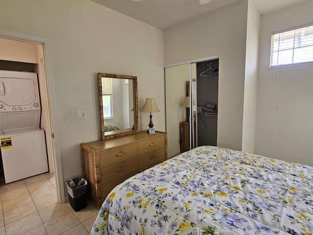 160 Kuli Puu St, Kihei, HI 96753 - bedroom with stacked washer and clothes dryer, light tile patterned floors, and a closet