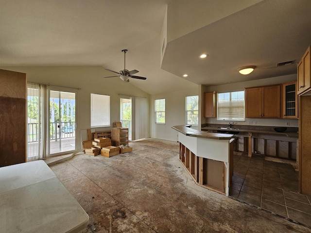 160 Kuli Puu St, Kihei, HI 96753 - kitchen featuring lofted ceiling, ceiling fan, brown cabinetry, open floor plan, and recessed lighting